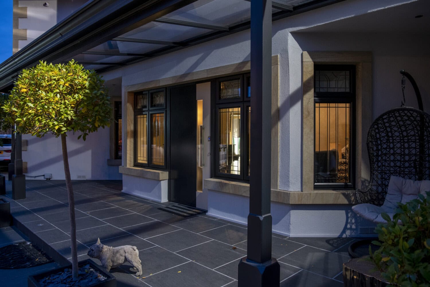 Glass veranda roof and frame detail on a bespoke UK garden installation