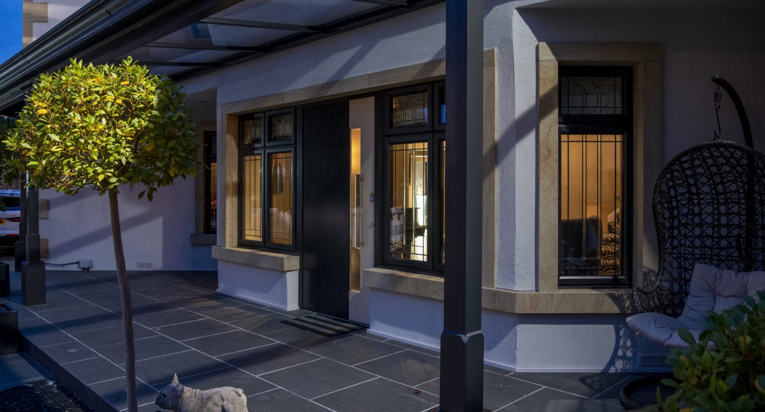 Glass veranda roof and frame detail on a bespoke UK garden installation