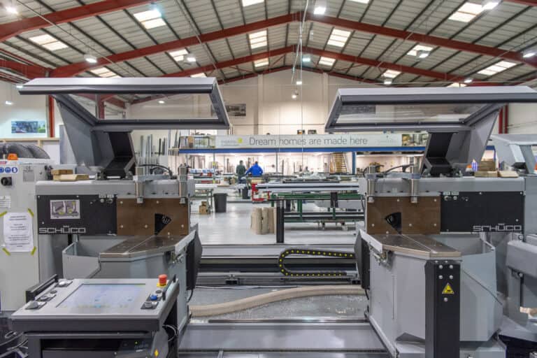 Window machines operating in a manufacturing warehouse